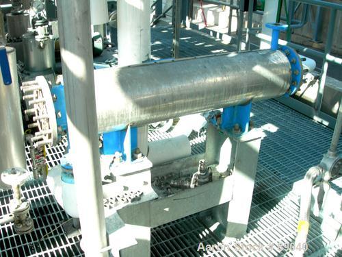 USED: Atlas four pass shell and tube heat exchanger, 17.6 square feet, horizontal. Carbon steel shell rated FV and 150 psi at 400 deg F, (28) 5/8" diameter x 4' long 316L stainless steel tubes rated ...