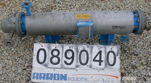 USED: Atlas four pass shell and tube heat exchanger, 17.6 square feet, horizontal. Carbon steel shell rated FV and 150 psi at 400 deg F, (28) 5/8" diameter x 4' long 316L stainless steel tubes rated ...