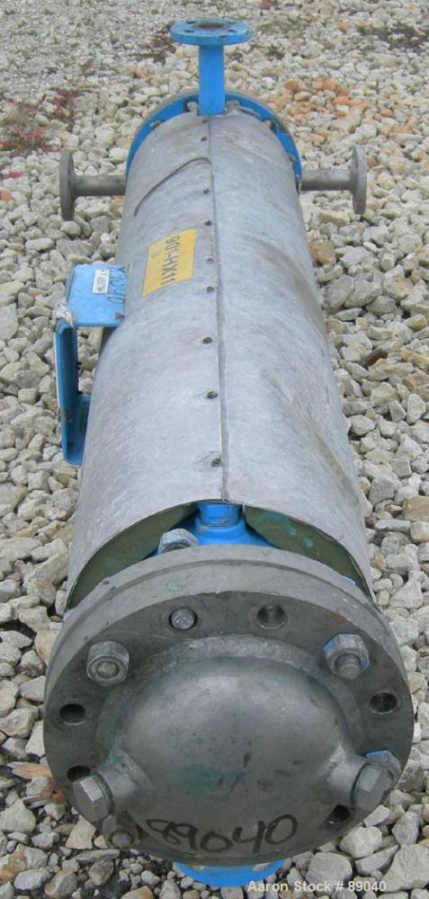 USED: Atlas four pass shell and tube heat exchanger, 17.6 square feet, horizontal. Carbon steel shell rated FV and 150 psi at 400 deg F, (28) 5/8" diameter x 4' long 316L stainless steel tubes rated ...