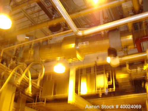 Used Atlas Single Pass Shell And Tube Heat Exchanger, 399 square feet, horizontal. Type BEM18-120. Carbon steel shell rated 100 psi at 300 deg.f., carbon steel baffles, and expansion ring. (208) 3/4"...