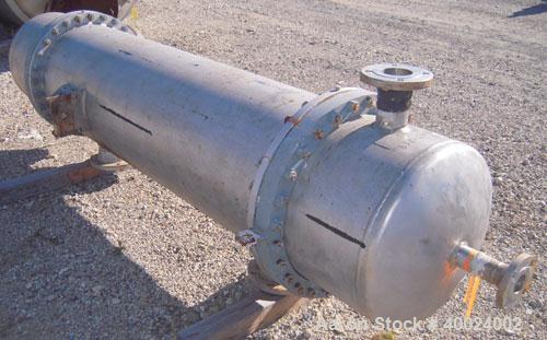 Used Atlas Shell And Tube Heat Exchanger,  411 square feet, vertical. Type BEM22-72. 316L stainless steel shell rated 100 psi at 300 deg.f., (350) 3/4" diameter x 6' long hastelloy C-22 tubes rated F...