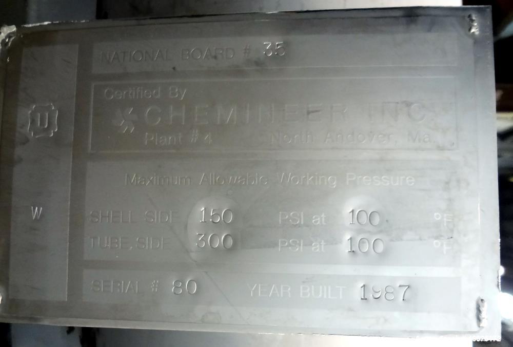 Used Chemineer Shell & Tube Heat Exchanger Static Mixer, Approximate 50 Square Feet, Vertical. 304 Stainless steel shell rated 150 psi at 100 degrees F. (64) 1" Diameter x 32" long 304 stainless stee...