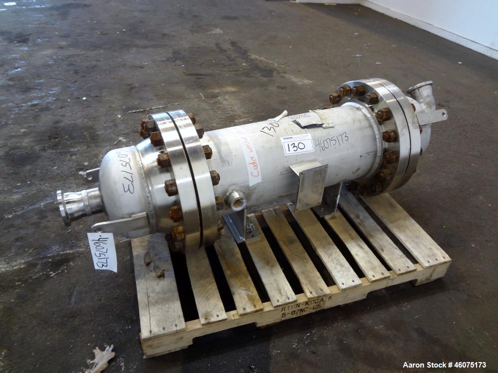 Used Chemineer Shell & Tube Heat Exchanger Static Mixer, Approximate 50 Square Feet, Horizontal. 304 Stainless steel shell rated 150 psi at 100 degrees F. (64) 1" Diameter x 32" long 304 stainless st...