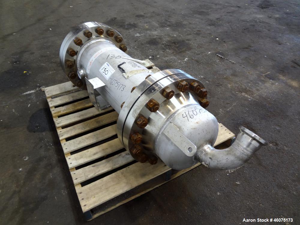 Used Chemineer Shell & Tube Heat Exchanger Static Mixer, Approximate 50 Square Feet, Horizontal. 304 Stainless steel shell rated 150 psi at 100 degrees F. (64) 1" Diameter x 32" long 304 stainless st...