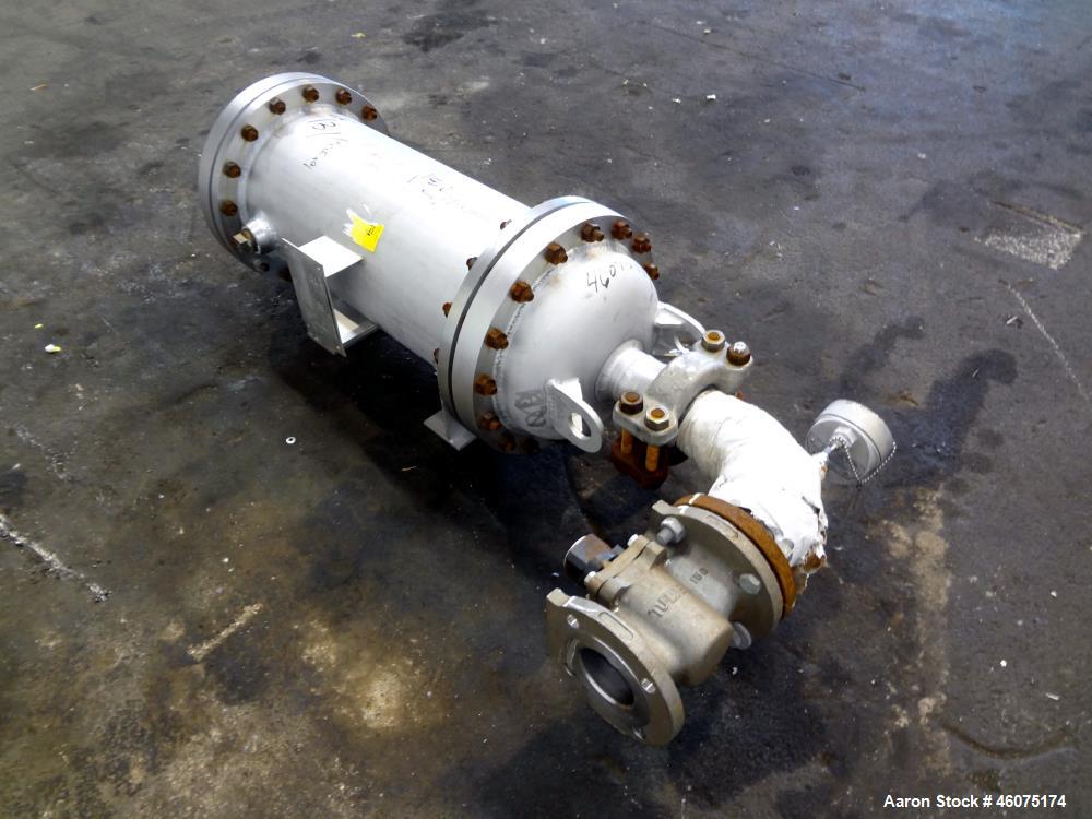 Used Chemineer Shell & Tube Heat Exchanger Static Mixer, Approximate 50 Square Feet, Vertical. 304 Stainless steel shell rated 150 psi at 100 degrees F. (64) 1" Diameter x 32" long 304 stainless stee...