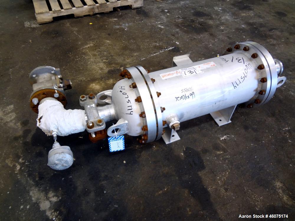 Used Chemineer Shell & Tube Heat Exchanger Static Mixer, Approximate 50 Square Feet, Vertical. 304 Stainless steel shell rated 150 psi at 100 degrees F. (64) 1" Diameter x 32" long 304 stainless stee...