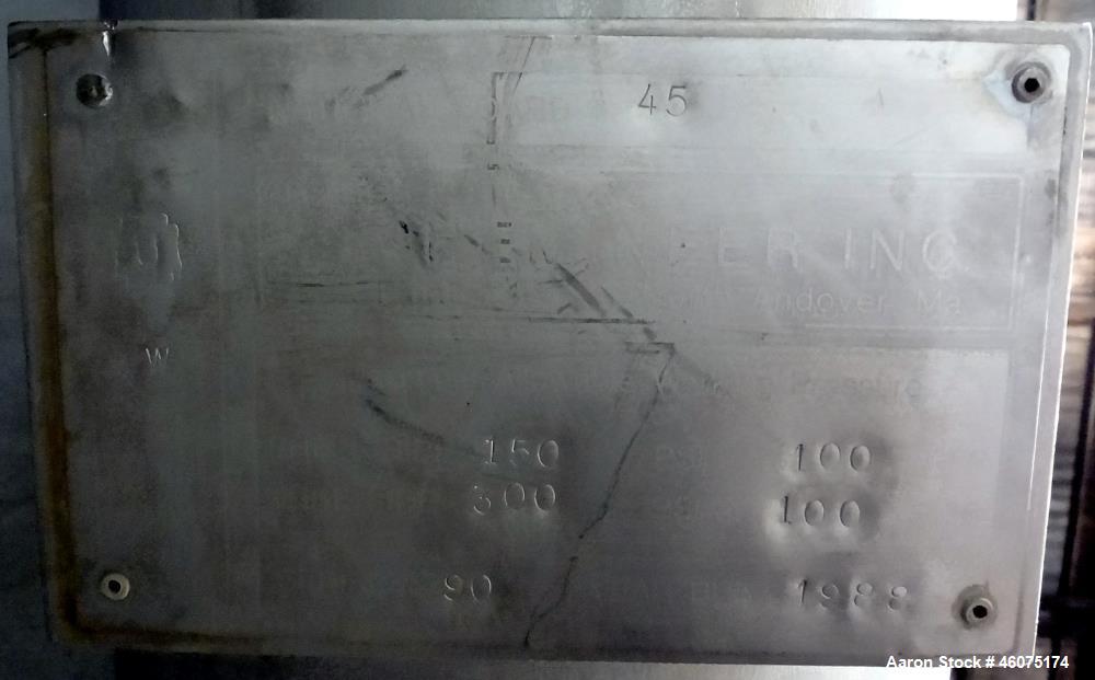 Used Chemineer Shell & Tube Heat Exchanger Static Mixer, Approximate 50 Square Feet, Vertical. 304 Stainless steel shell rated 150 psi at 100 degrees F. (64) 1" Diameter x 32" long 304 stainless stee...