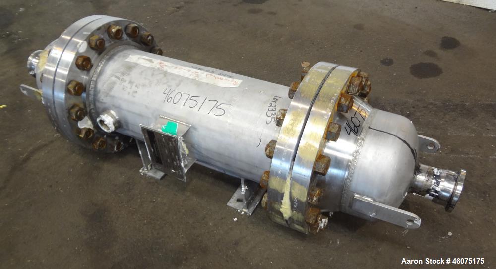 Used Chemineer Shell & Tube Heat Exchanger Static Mixer, Approximate 50 Square Feet, Horizontal. 304 Stainless steel shell rated 150 psi at -20 to 100 degrees F. (64) 1" Diameter x 32" long 304 stain...
