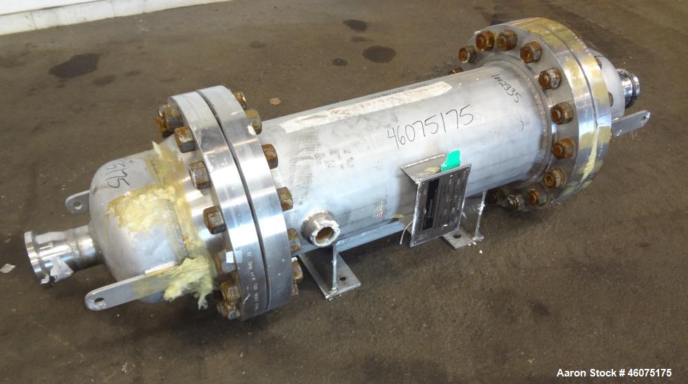 Used Chemineer Shell & Tube Heat Exchanger Static Mixer, Approximate 50 Square Feet, Horizontal. 304 Stainless steel shell rated 150 psi at -20 to 100 degrees F. (64) 1" Diameter x 32" long 304 stain...