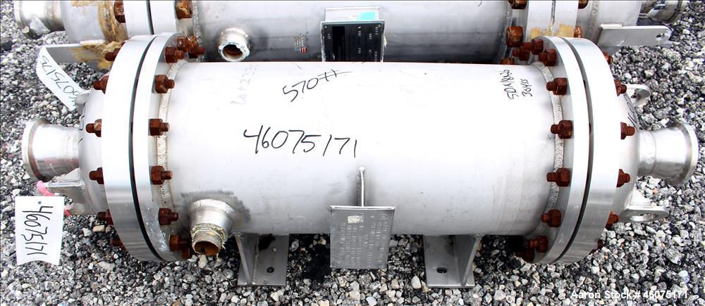 Used Chemineer Shell & Tube Heat Exchanger, 38 Square Feet, Horizontal. 304 Stainless steel shell rated 150 psi at 100 degrees F. (64) 1" Diameter x 28" long 304 stainless steel tubes rated 300 psi 1...