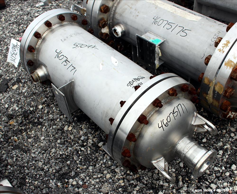 Used Chemineer Shell & Tube Heat Exchanger, 38 Square Feet, Horizontal. 304 Stainless steel shell rated 150 psi at 100 degrees F. (64) 1" Diameter x 28" long 304 stainless steel tubes rated 300 psi 1...