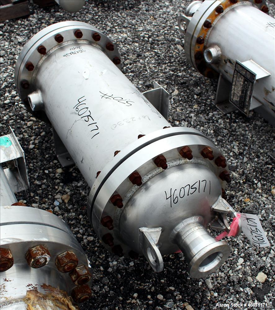 Used Chemineer Shell & Tube Heat Exchanger, 38 Square Feet, Horizontal. 304 Stainless steel shell rated 150 psi at 100 degrees F. (64) 1" Diameter x 28" long 304 stainless steel tubes rated 300 psi 1...