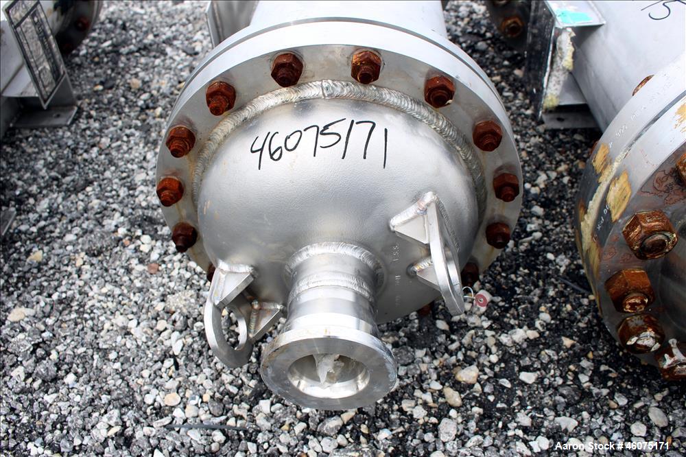 Used Chemineer Shell & Tube Heat Exchanger, 38 Square Feet, Horizontal. 304 Stainless steel shell rated 150 psi at 100 degrees F. (64) 1" Diameter x 28" long 304 stainless steel tubes rated 300 psi 1...