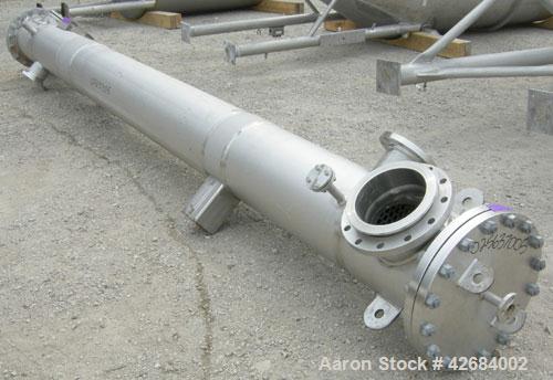 Used Dedert Shell & Tube Heat Flash Condenser, approximately 357 square feet, vertical. 316L Stainless steel shell rated 100/-15 psi at 250 deg F, (97) 1'' diameter x 15' long 316L stainless steel tu...