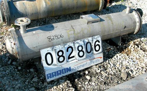 Used Doring & Baumer Six Pass Shell and Tube Heat Exchanger, 157 square feet, horizontal. 304 stainless steel shell rated 6 bar (87 psi) at 100 deg C (212 deg F). (200) 1/2" diameter x 6' long 304 st...