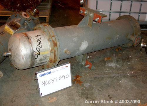 Used: Doyle and Roth shell and tube heat exchanger, 98 square feet, vertical. Carbon steel shell rated 100 psi at 100 deg.f., (126) 3/4" diameter x 4' long 316 stainless steel tubes rated fv/75 psi a...