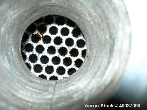 Used: Doyle and Roth shell and tube heat exchanger, 98 square feet, vertical. Carbon steel shell rated 100 psi at 100 deg.f., (126) 3/4" diameter x 4' long 316 stainless steel tubes rated fv/75 psi a...