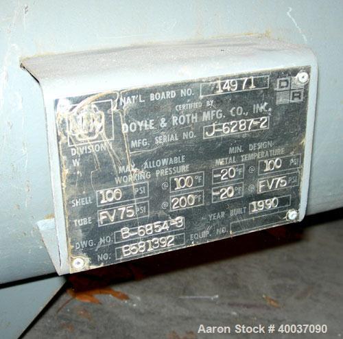 Used: Doyle and Roth shell and tube heat exchanger, 98 square feet, vertical. Carbon steel shell rated 100 psi at 100 deg.f., (126) 3/4" diameter x 4' long 316 stainless steel tubes rated fv/75 psi a...