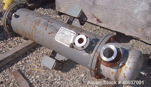 Used Doyle and Roth Shell and Tube Heat Exchanger, 98 square feet, vertical. Carbon steel shell rated 100 psi at 100 deg F, (126) 3/4" diameter x 4' long 316 stainless steel tubes rated fv/75 psi at ...