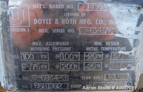 Used- Doyle and Roth Shell and Tube Heat Exchanger, 98 square feet, vertical. Carbon steel shell rated 100 psi at 100 deg F,...