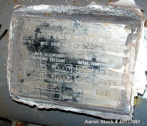 Used Doyle and Roth Shell and Tube Heat Exchanger, 98 square feet, vertical. Carbon steel shell rated 100 psi at 100 deg F, (126) 3/4" diameter x 4' long 316 stainless steel tubes rated fv/75 psi at ...