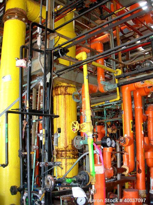 Used: Doyle and Roth shell and tube heat exchanger, 99 square feet, vertical. Carbon steel shell rated 75 psi at 400 deg F, (85) 3/4" diameter x 6' long 316 stainless steel tubes rated 75 psi at 400 ...