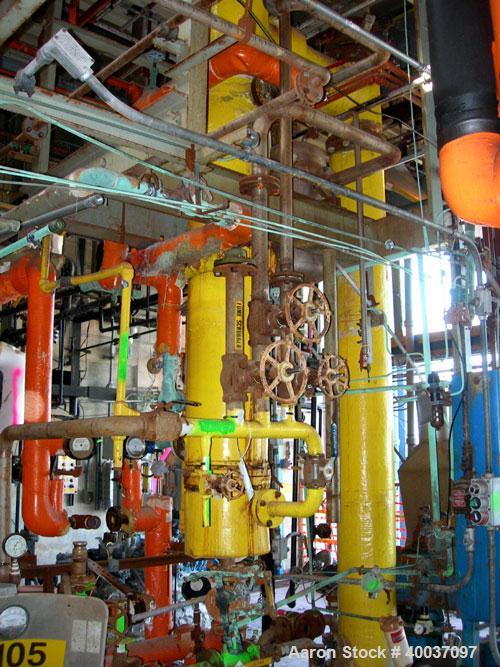 Used: Doyle and Roth shell and tube heat exchanger, 99 square feet, vertical. Carbon steel shell rated 75 psi at 400 deg F, (85) 3/4" diameter x 6' long 316 stainless steel tubes rated 75 psi at 400 ...