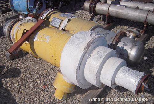 Used Doyle And Roth Shell And Tube Heat Exchanger, 98 square feet, vertical. Carbon steel shell rated 100 psi at 100 deg.f., (126) 3/4" diameter x 4' long 316 stainless steel tubes rated fv/75 psi at...