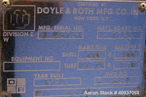 Used Doyle And Roth Shell And Tube Heat Exchanger, 98 square feet, vertical. Carbon steel shell rated 100 psi at 100 deg.f., (126) 3/4" diameter x 4' long 316 stainless steel tubes rated fv/75 psi at...