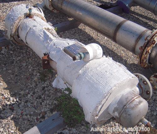 Used Doyle And Roth Shell And Tube Heat Exchanger, 31 square feet, vertical. Carbon steel shell rated 125 psi at 375 deg.f., (40) 3/4" diameter x 4' long 316 stainless steel tubes rated 125 psi at 37...