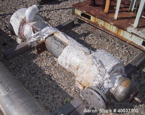 Used Doyle And Roth Shell And Tube Heat Exchanger, 31 square feet, vertical. Carbon steel shell rated 125 psi at 375 deg.f., (40) 3/4" diameter x 4' long 316 stainless steel tubes rated 125 psi at 37...