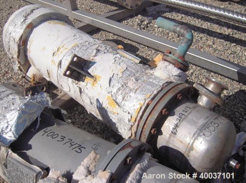 Used Doyle And Roth Shell And Tube Heat Exchanger, 98 square feet, vertical. Carbon steel shell rated 100 psi at 100 deg.f., (126) 3/4" diameter x 4' long 316 stainless steel tubes rated fv/75 psi at...