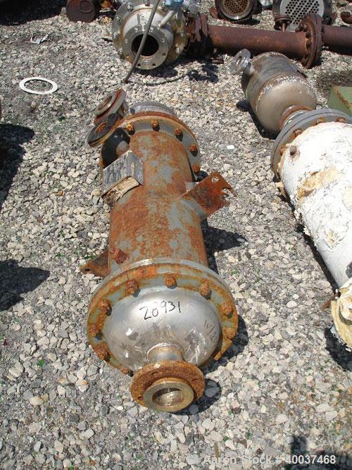 Used Doyle and Roth Shell and Tube Heat Exchanger, 99 square feet, vertical. Carbon steel shell rated 100 psi at 100 deg F, (254) 1/2" diameter x 3' long 316 stainless steel tubes rated fv/75 psi at ...