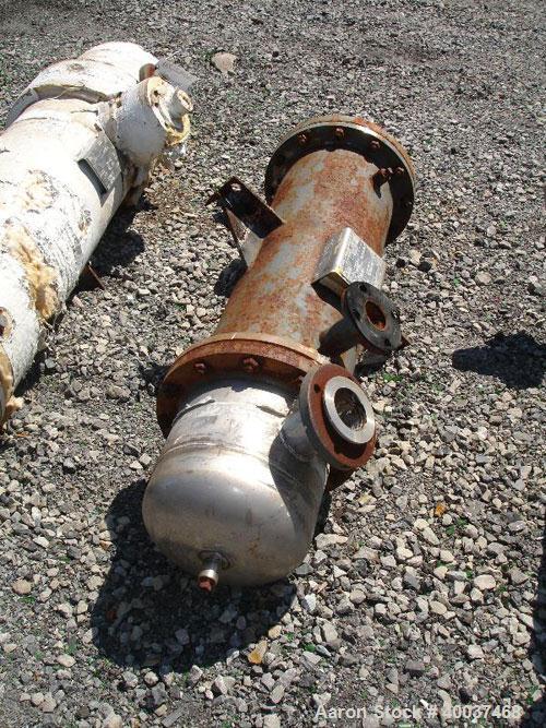 Used Doyle and Roth Shell and Tube Heat Exchanger, 99 square feet, vertical. Carbon steel shell rated 100 psi at 100 deg F, (254) 1/2" diameter x 3' long 316 stainless steel tubes rated fv/75 psi at ...