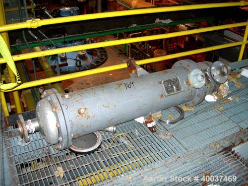 Used: Doyle and  Roth shell and tube heat exchanger, 98 square feet, vertical. Carbon steel shell rated 100 psi at 100 deg.f., (126) 3/4" diameter x 4' long 316 stainless steel tubes rated fv/75 psi ...