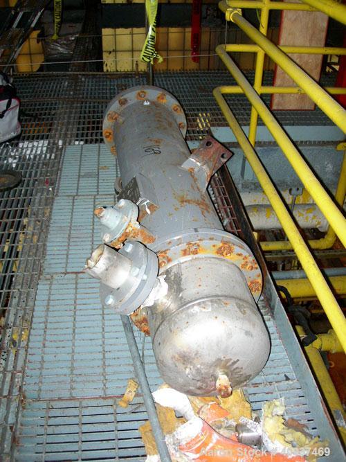 Used: Doyle and  Roth shell and tube heat exchanger, 98 square feet, vertical. Carbon steel shell rated 100 psi at 100 deg.f., (126) 3/4" diameter x 4' long 316 stainless steel tubes rated fv/75 psi ...