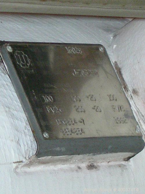 Used: Doyle and  Roth shell and tube heat exchanger, 98 square feet, vertical. Carbon steel shell rated 100 psi at 100 deg.f., (126) 3/4" diameter x 4' long 316 stainless steel tubes rated fv/75 psi ...