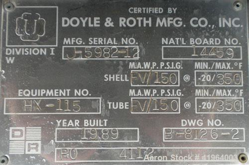 Used Doyle & Roth Shell and Tube Heat Exchanger, 416 square feet, vertical. Carbon steel shell rated FV/150 psi at 
–20/350 deg F, (118) 3/4" diameter x 18' long 316L stainless steel tubes rated FV/1...