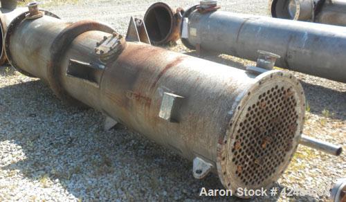 Used Doyle and Roth Single Pass Shell and Tube Heat Exchanger, 969 square feet, horizontal. 316L Stainless steel shell with expansion ring rated 50 psi at –20 to 350 degrees F. (247) 1-1/4" Diameter ...