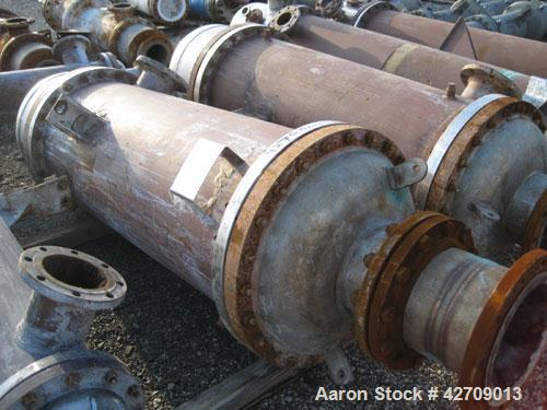 Used Doyle & Roth Shell And Tube Heat Exchanger, 491 Square Feet, Vertical. Carbon steel shell rated 150 psi at –20/350 deg.f., (502) 3/4" diameter x 5' long 316L stainless steel tubes rated FV/150 p...
