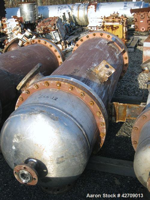 Used Doyle & Roth Shell And Tube Heat Exchanger, 491 Square Feet, Vertical. Carbon steel shell rated 150 psi at –20/350 deg.f., (502) 3/4" diameter x 5' long 316L stainless steel tubes rated FV/150 p...