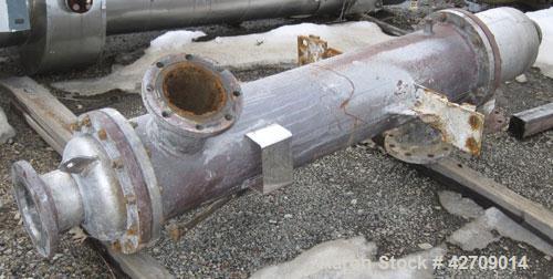 Used Doyle & Roth Shell And Tube Heat Exchanger, 123 Square Feet, Vertical. Carbon steel shell rated 150 psi at –20/350 deg.f., (126) 3/4" Diameter x 5' long 316L stainless steel tubes rated FV/150 p...