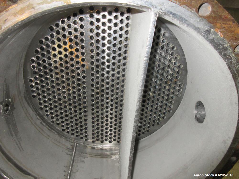 Used Doyle & Roth Shell & Tube Heat Exchanger, Horizontal. Approximate 1,115 Square Feet. Carbon steel shell rated 150 psi at -20 to 150 degrees F. (568) 304L Stainless steel 3/4" diameter x 10' long...