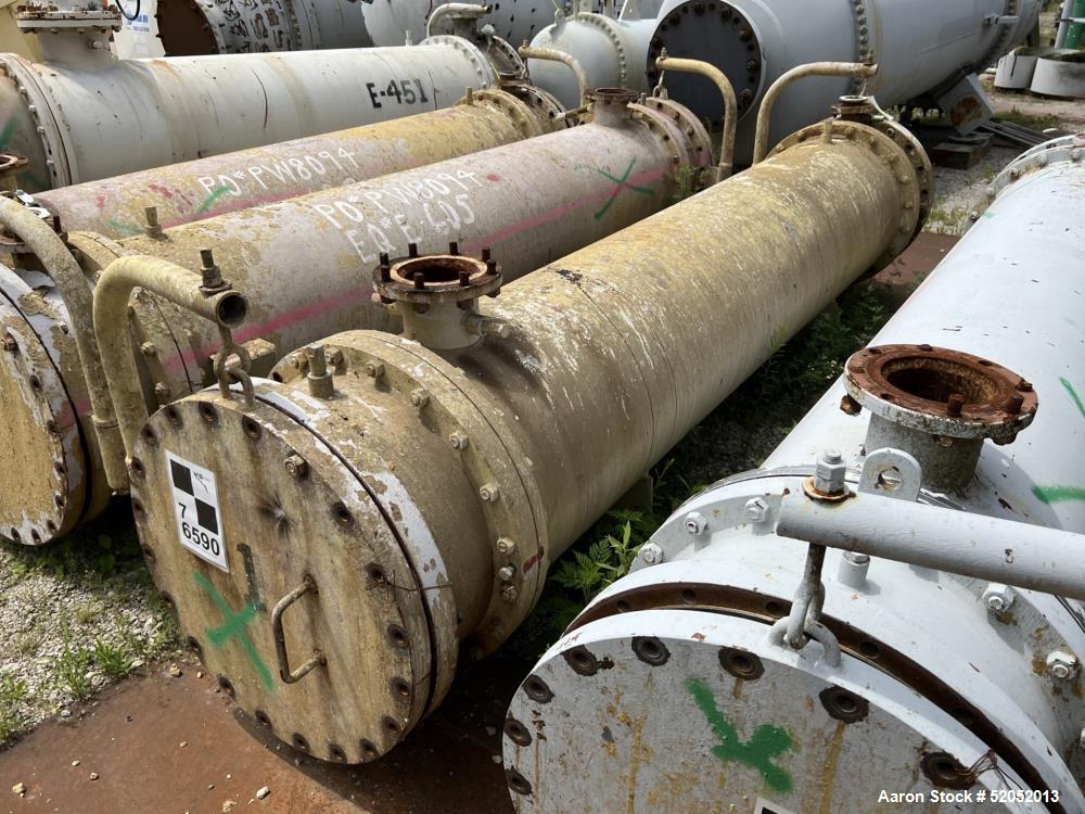 Used Doyle & Roth Shell & Tube Heat Exchanger, Horizontal. Approximate 1,115 Square Feet. Carbon steel shell rated 150 psi at -20 to 150 degrees F. (568) 304L Stainless steel 3/4" diameter x 10' long...