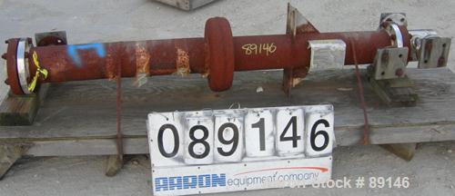 USED: Doyle and Roth multi-pass shell and tube heat exchanger, 18.8 square feet, vertical. Carbon steel shell with expansion ring rated 150 psi at 600 deg F. (16) 3/4" diameter x 72" long 316L stainl...
