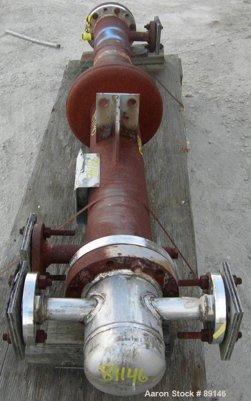 USED: Doyle and Roth multi-pass shell and tube heat exchanger, 18.8 square feet, vertical. Carbon steel shell with expansion ring rated 150 psi at 600 deg F. (16) 3/4" diameter x 72" long 316L stainl...