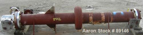USED: Doyle and Roth multi-pass shell and tube heat exchanger, 18.8 square feet, vertical. Carbon steel shell with expansion ring rated 150 psi at 600 deg F. (16) 3/4" diameter x 72" long 316L stainl...
