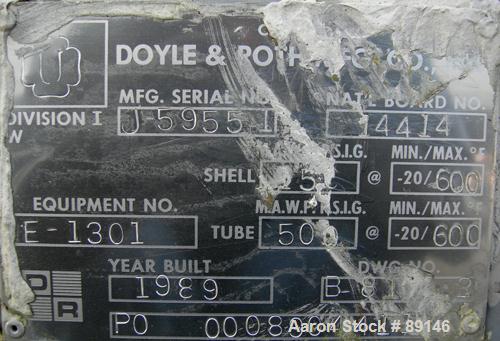 USED: Doyle and Roth multi-pass shell and tube heat exchanger, 18.8 square feet, vertical. Carbon steel shell with expansion ring rated 150 psi at 600 deg F. (16) 3/4" diameter x 72" long 316L stainl...