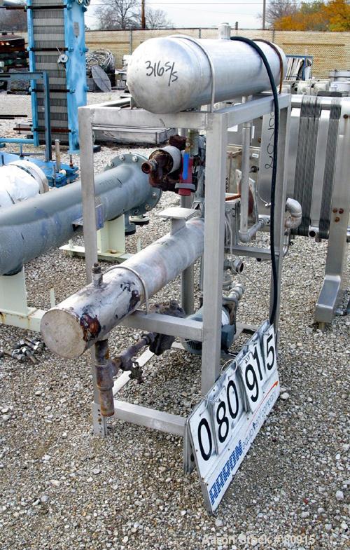 USED:Enfab 4 pass shell and tube heat exchanger, 12 sq ft, modelSA4C4, 316 stainless steel, horizontal. 316 stainless steel shellrated 150 psi at 350 deg F. Stainless steel head. (14) 3/4" diameterx ...
