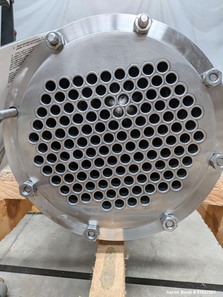 Unused- Enerquip Shell & Tube Heat Exchanger, Stainless Steel, Vertical. Approximate 132 square feet. 304L Stainless steel shell rated 150 psi at -20 to 375 degrees F. (126) 316L Stainless steel stra...